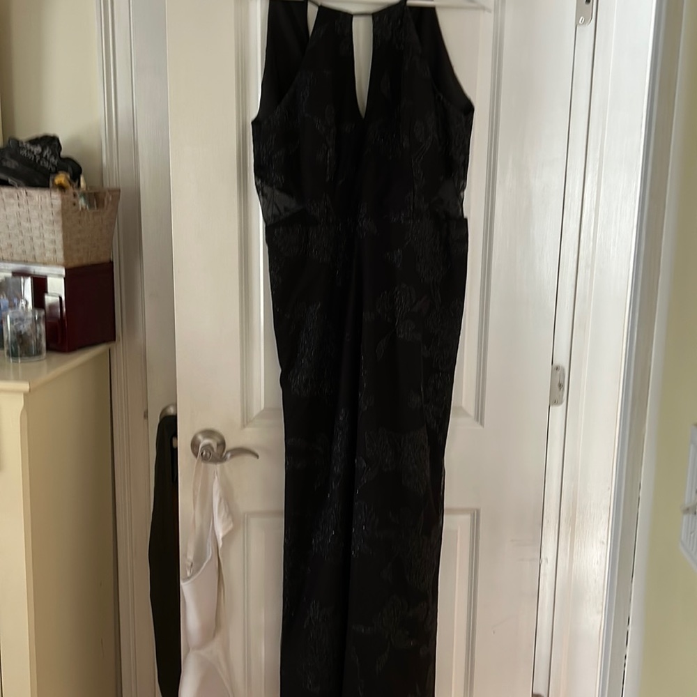Mother of the bride dress sz 16 . Lots of alterations. Professionally done.